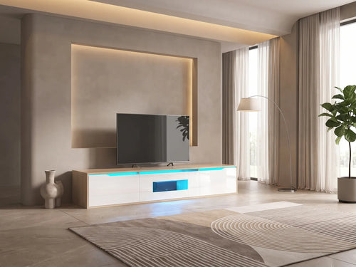 Meuble TV Bas Bois et Blanc Laqué avec LED 180 cm MODERNLUXE dans un salon moderne lumineux aux tons chauds, vue de face